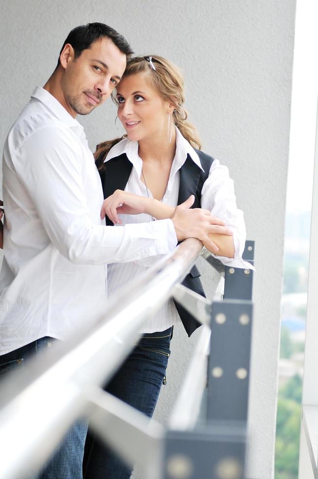 romantic happpy couple on balcony photo