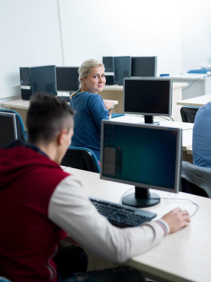 students group in computer lab classroom photo