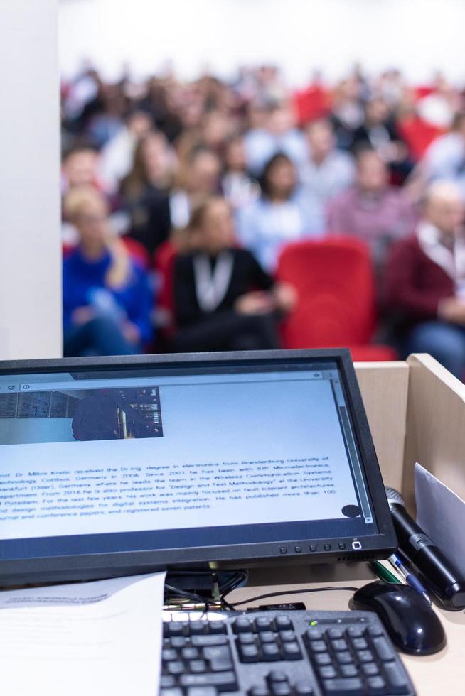 laptop computer at podium photo
