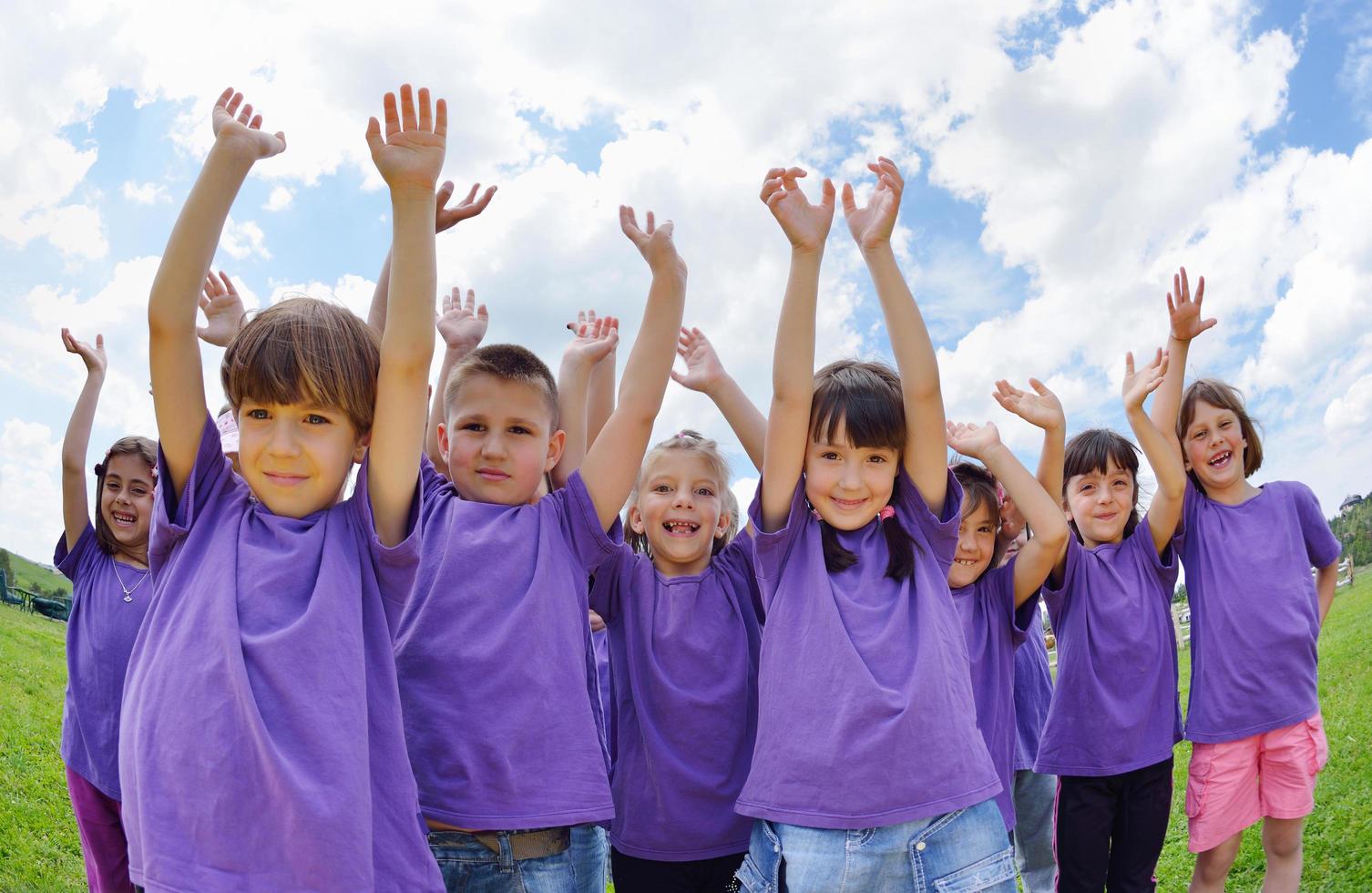 happy kids group  have fun in nature photo