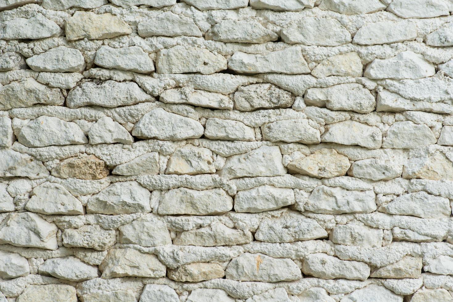 fondo de pared de piedra blanca foto