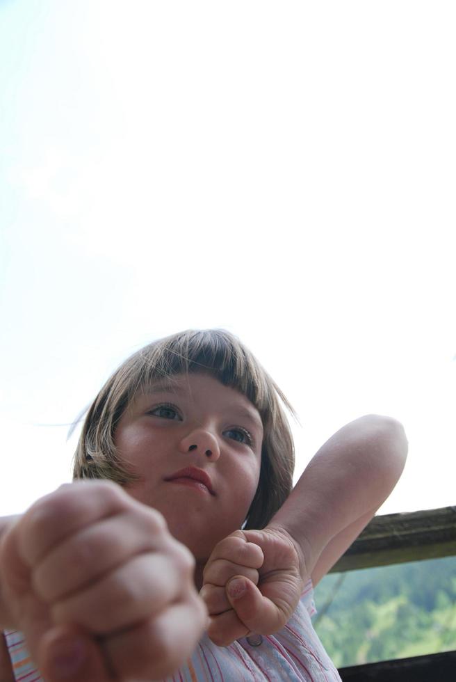 Child playing outside photo