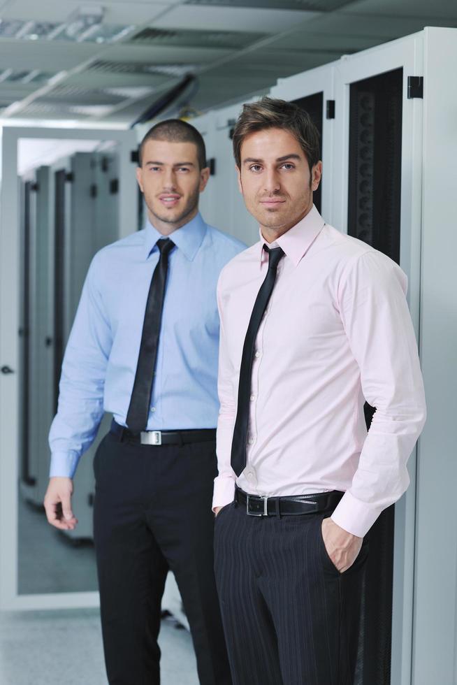 it engineers in network server room photo