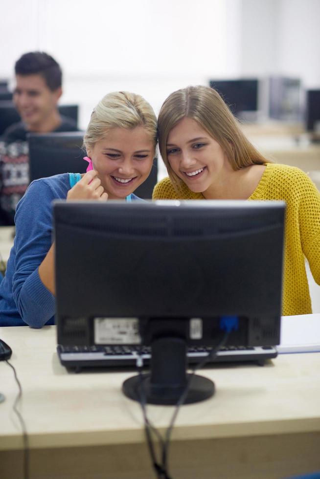 students group in computer lab classroom photo