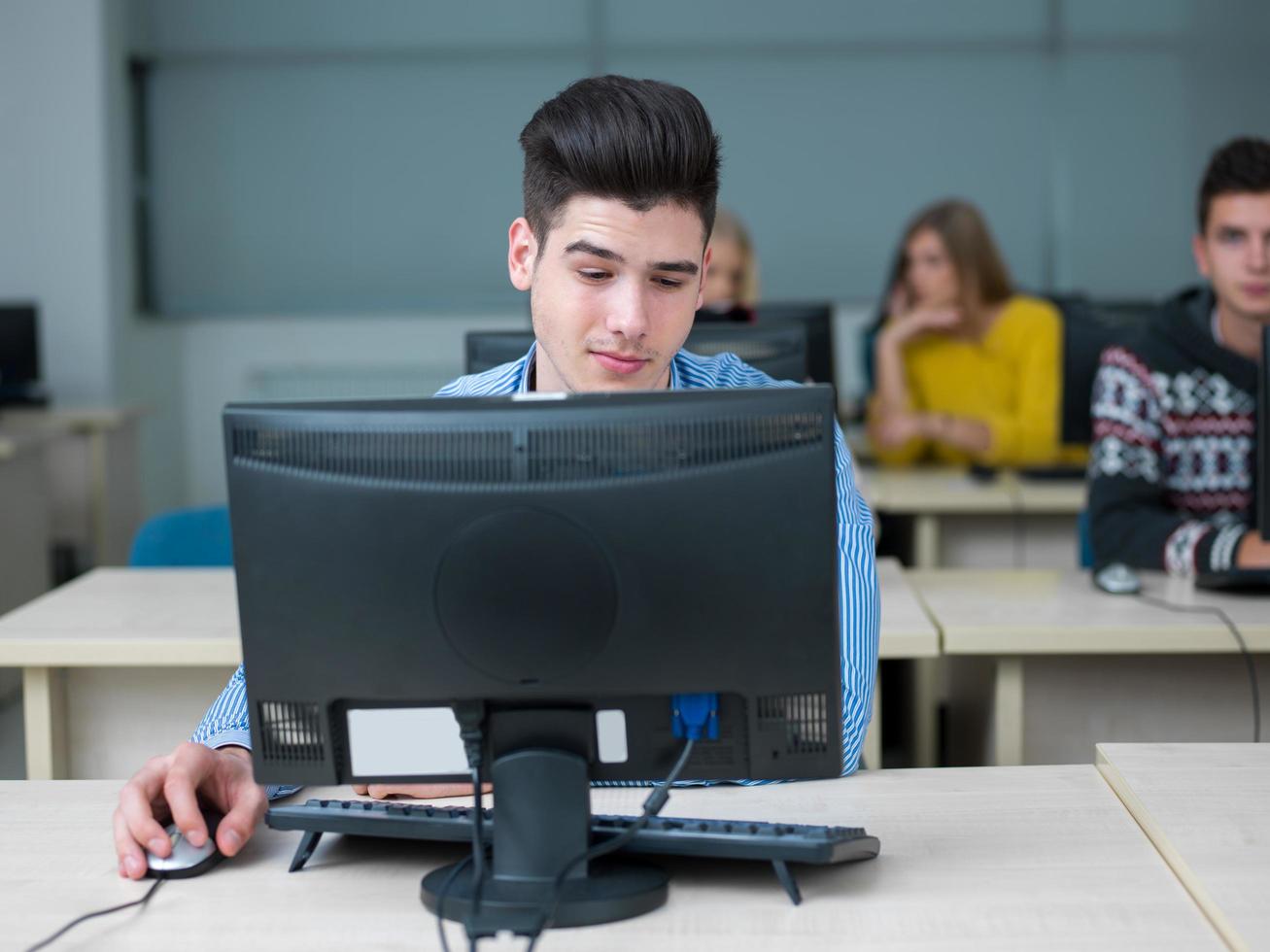 students group in computer lab classroom photo