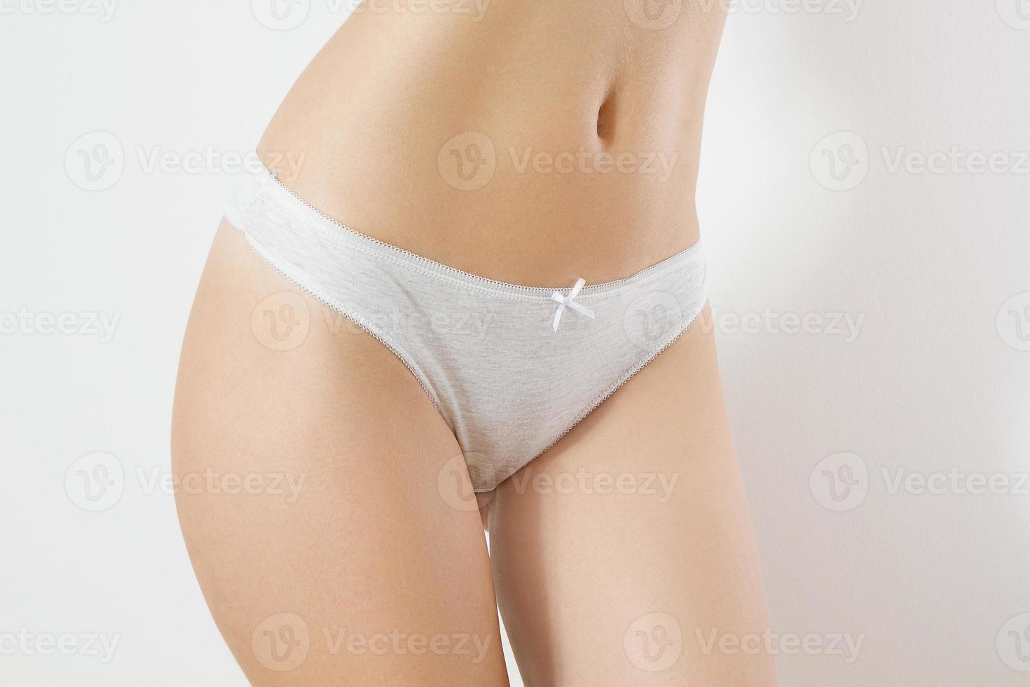 Close up Blank Template Gray Women Panties Front view mock up. Gynecological woman health and menstrual cycle concept. Shave bikini line and hair removal concept. Female underwear mockup, copy space. photo