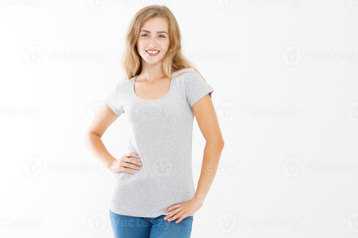 Young blonde woman with fit slim body in blank template t shirt and jeans isolated on white background. Skin and hair care. Copy space and mock up photo