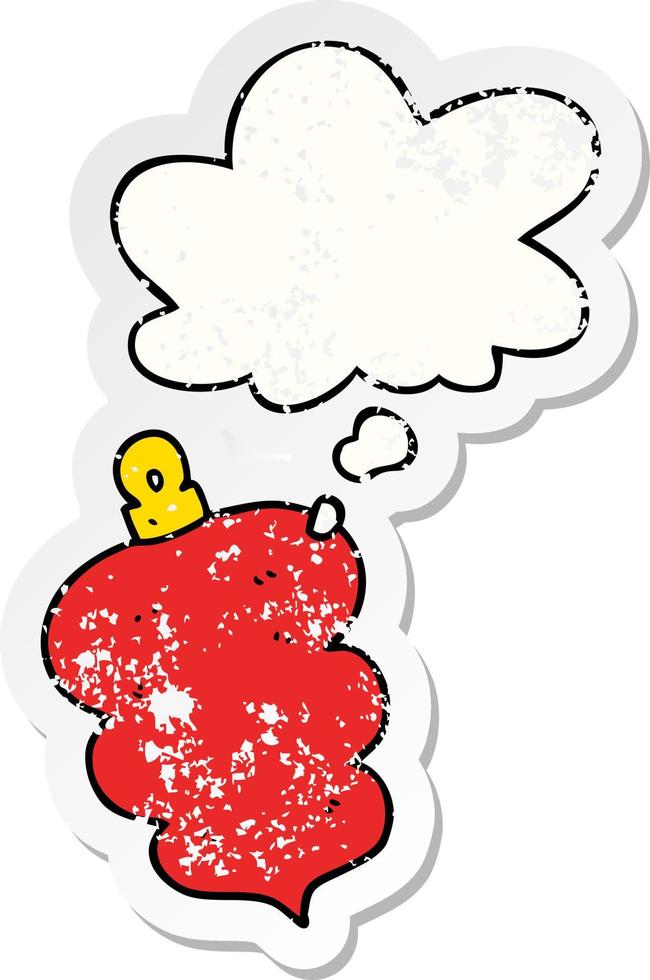 cartoon christmas bauble and thought bubble as a distressed worn sticker vector