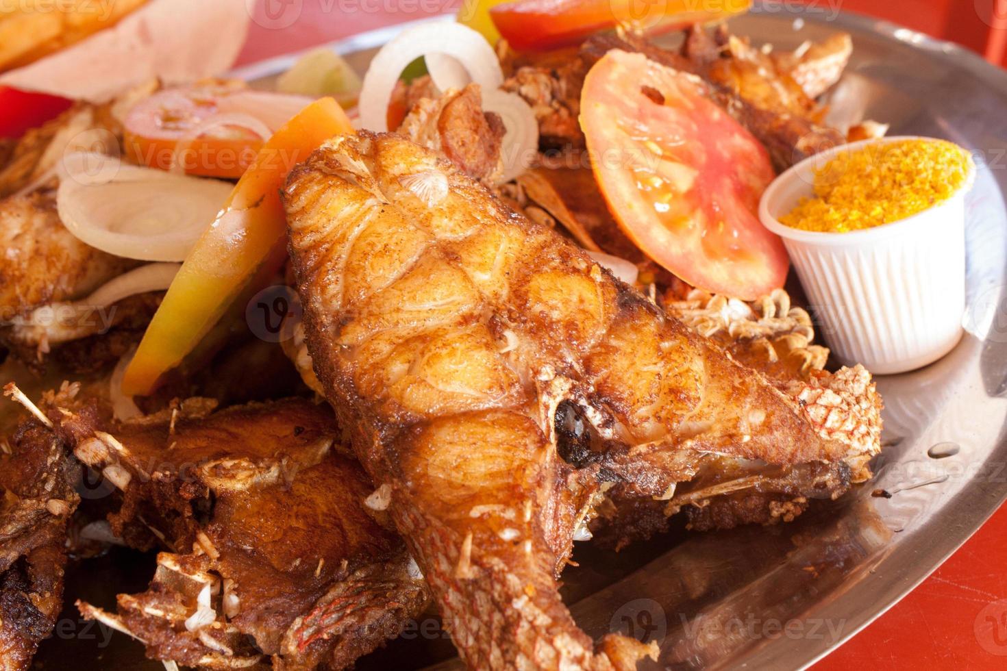 Delicious Freshly Fried Red Snapper severed up on a platter photo