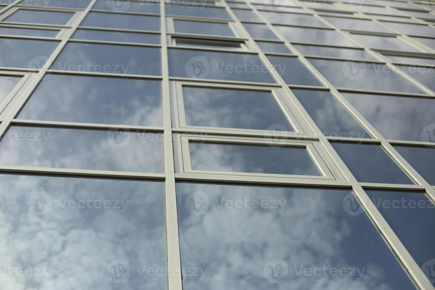 Windows in building. Mirror surface in building. photo