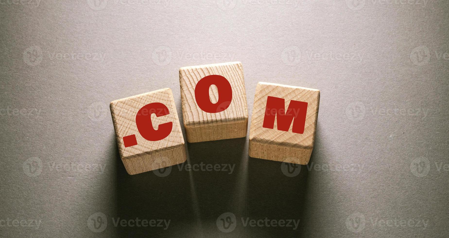 Com Word with Wooden Cubes photo