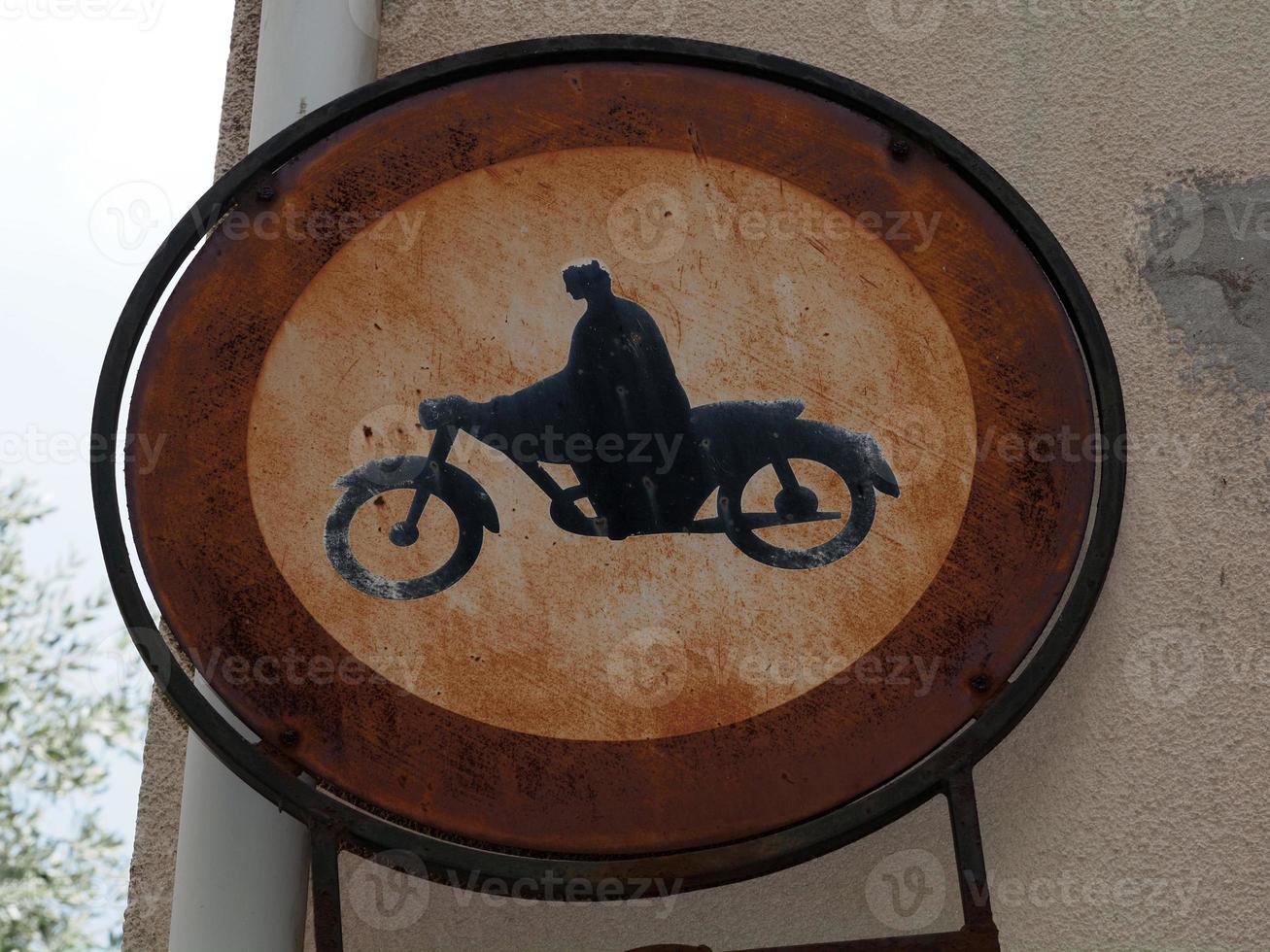 very old no motorbike passing road sign photo
