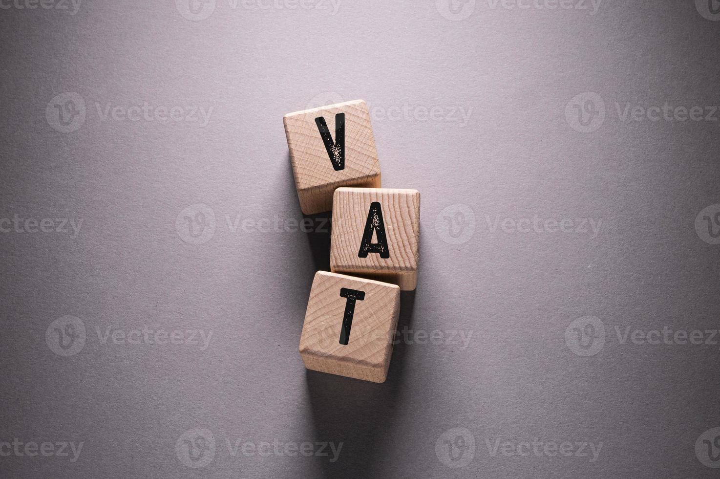 Vat Word with Wooden Cubes 11944792 Stock Photo at Vecteezy