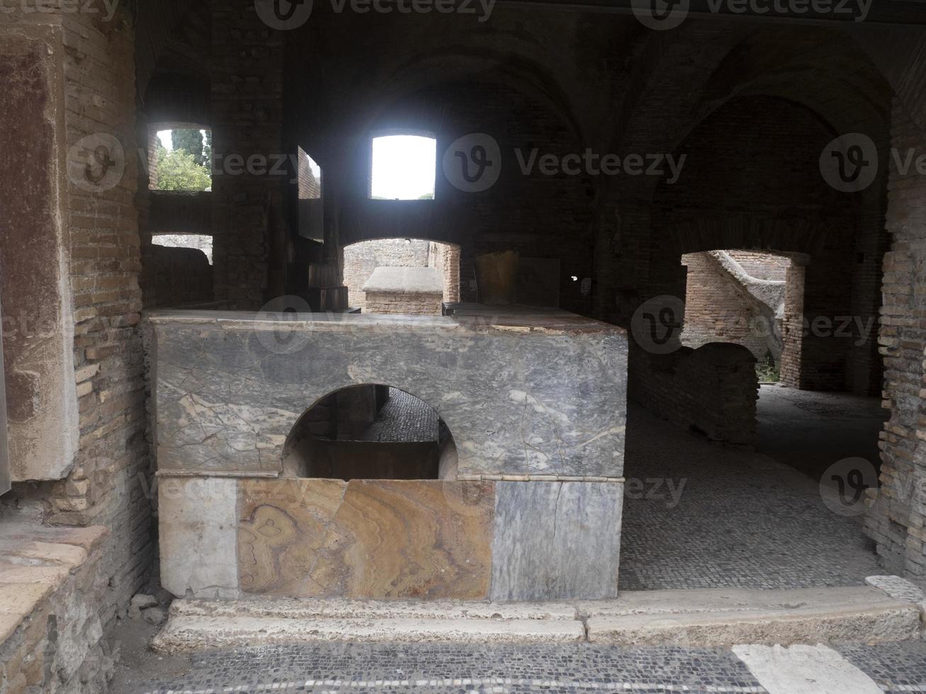 thermopolium old wine bar at old ancient ostia archeological ruins photo