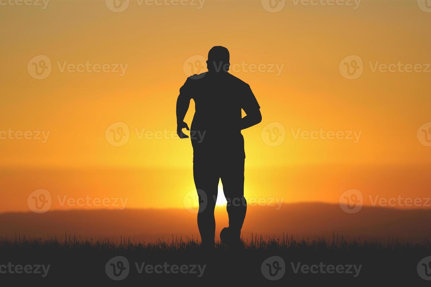 men's silhouette I am jogging to stay healthy in the evening. Men exercise by running. health care concept photo