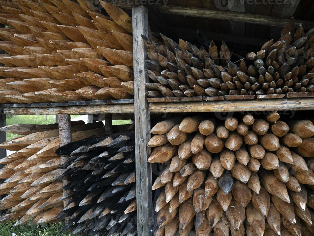 Pointed wood logs pattern photo