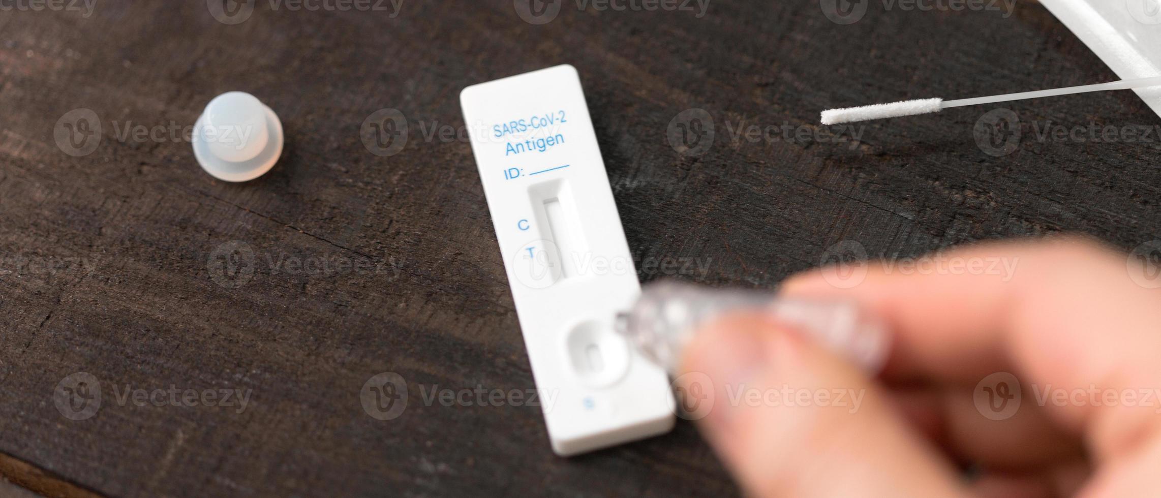 Corona virus antigen fast test. Lab card kit test for COVID-19. photo