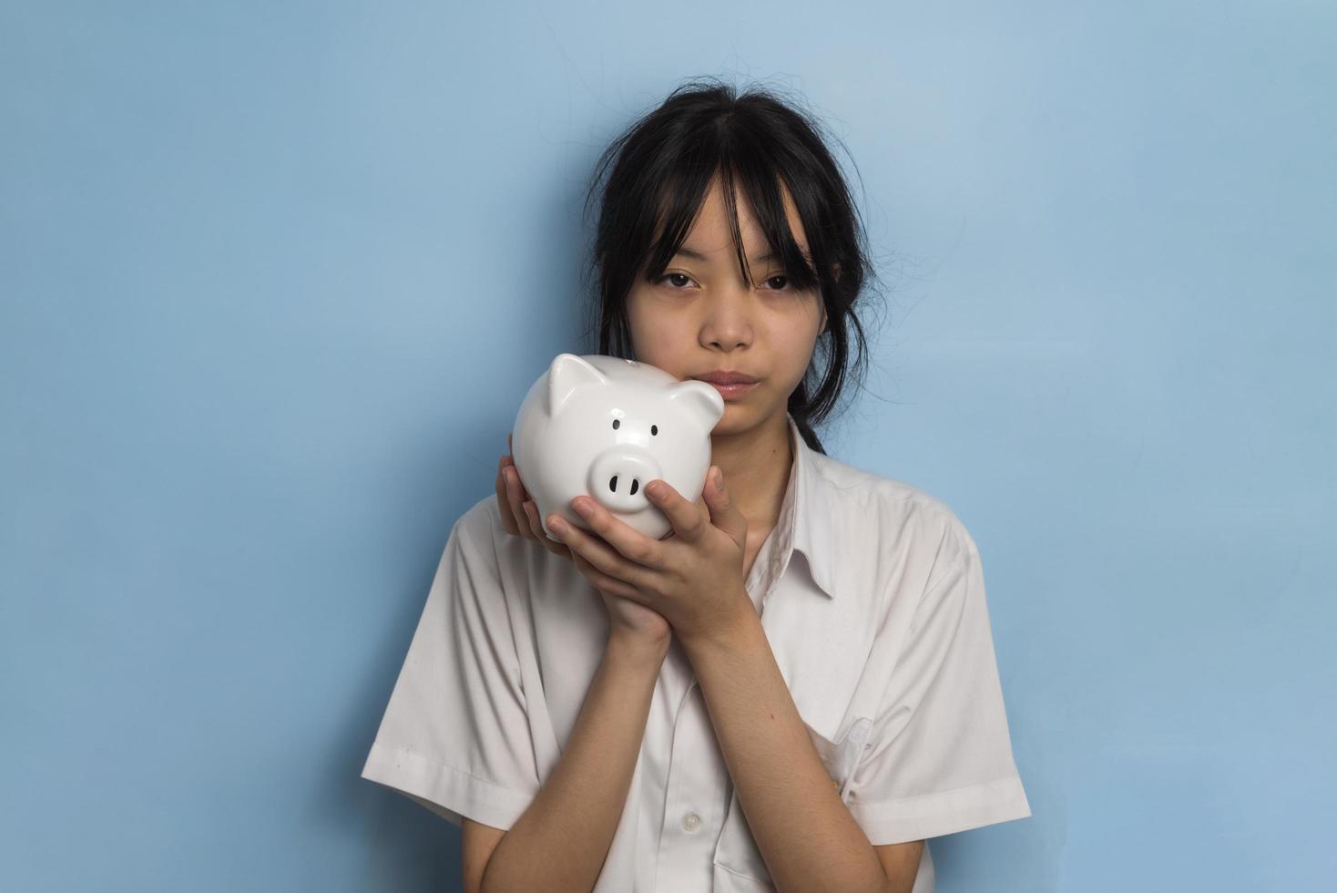 child asian finance economic investment wealth pig currency money business banking, cash success saving girl holding coin piggy bank. photo