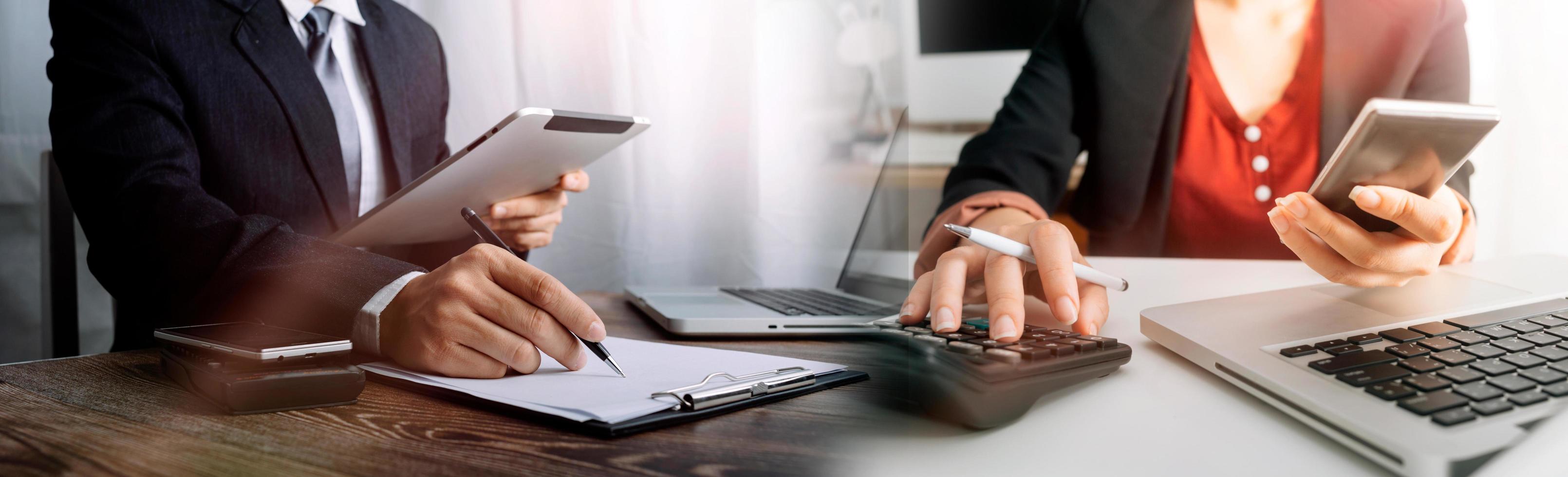 Business accounting concept, Business man using calculator with computer laptop, budget and loan paper in office. photo