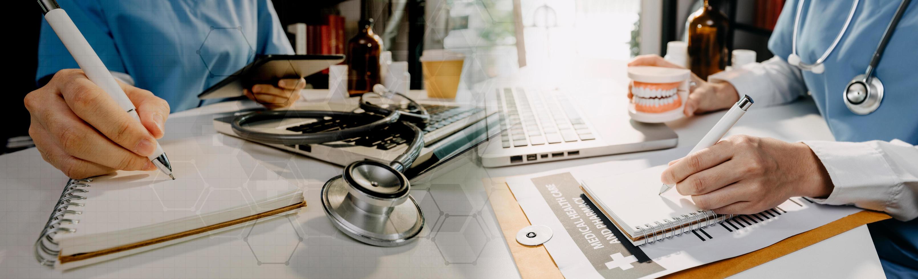 Medicine doctor hand working on a patients x-ray scans digital healthcare and connection with modern virtual screen interface icons, Medical technology and network concept. photo