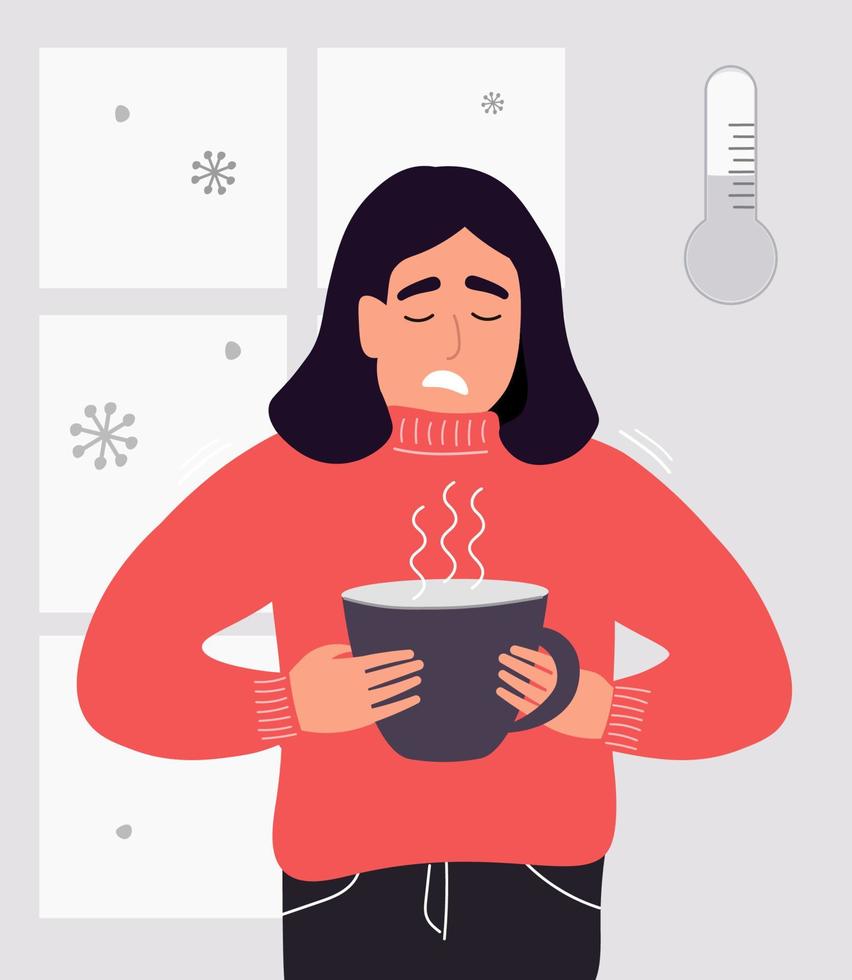 The girl is freezing at the window in her house, a hot drink is warming up. It's cold in the apartment in winter. Vector graphics.