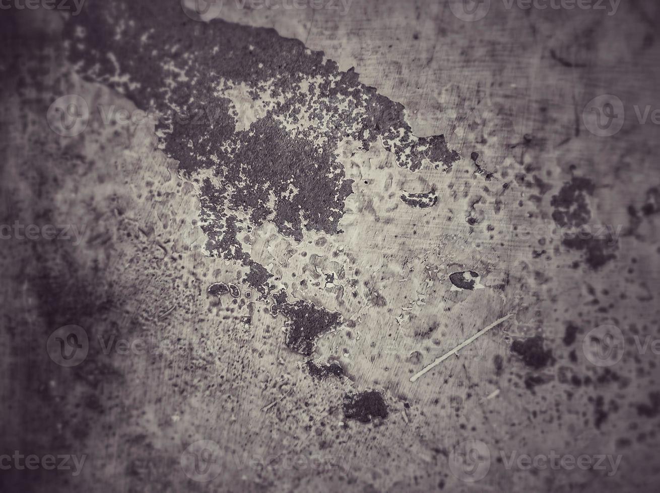 Old Wall damaged with blown Plaster and paint clog,peeling paint damage,water damage on building wall.Grunge abstract background.Wall fragment with scratches and cracks.Old distressed wall backdrop. photo