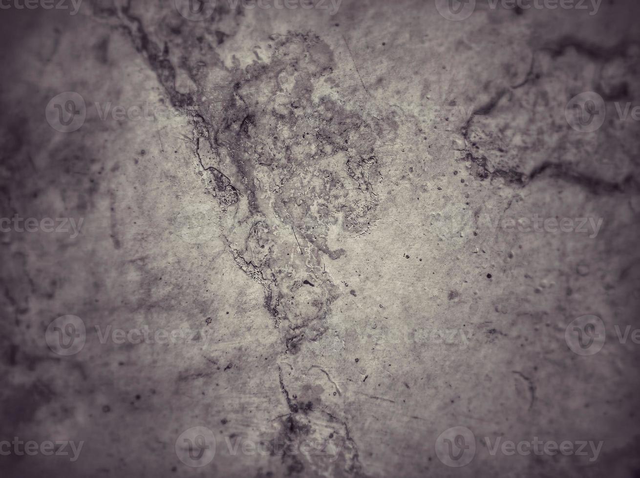 Old Wall damaged with blown Plaster and paint clog,peeling paint damage,water damage on building wall.Grunge abstract background.Wall fragment with scratches and cracks.Old distressed wall backdrop. photo