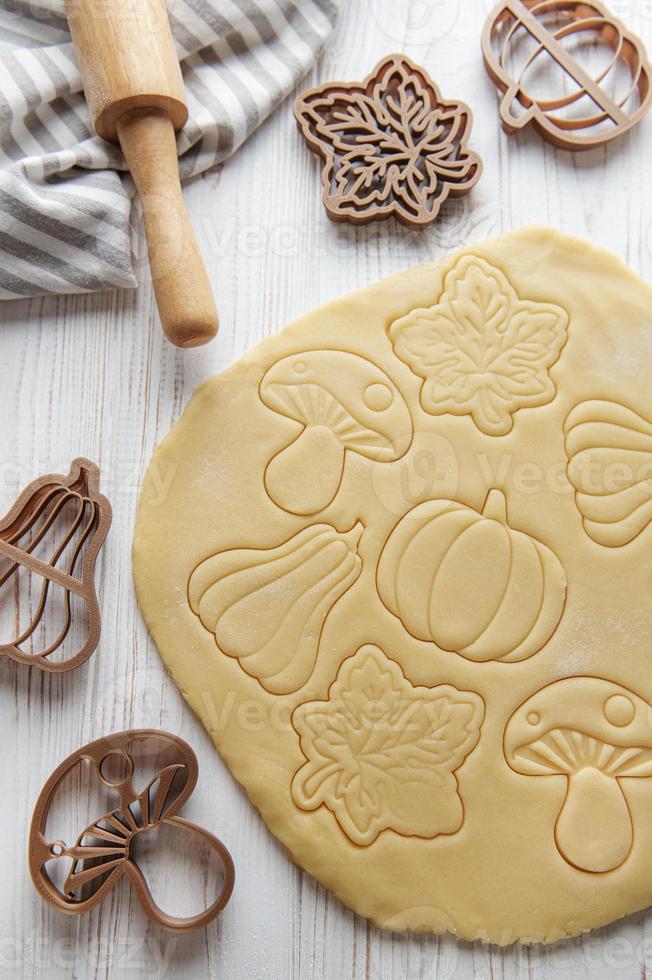 Baking cookies in the form of pumpkin and leaves photo