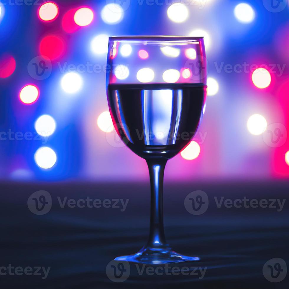 a glass of wine, bokeh background premium photo