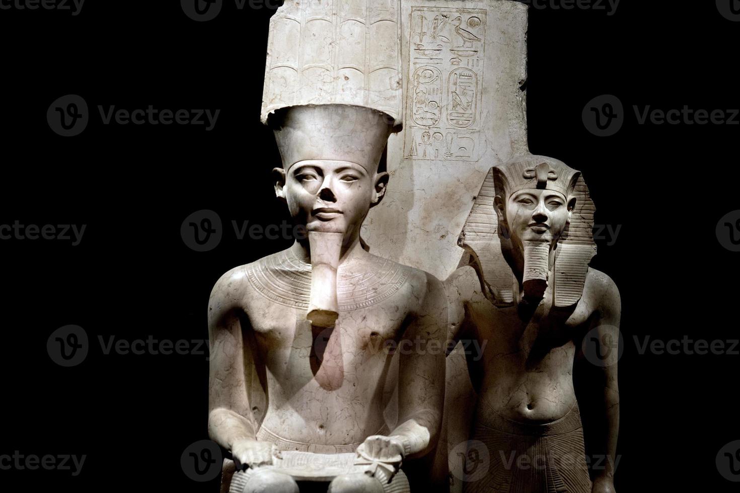 Horomeb Pharaoh with egyptian god Amon stone statue photo