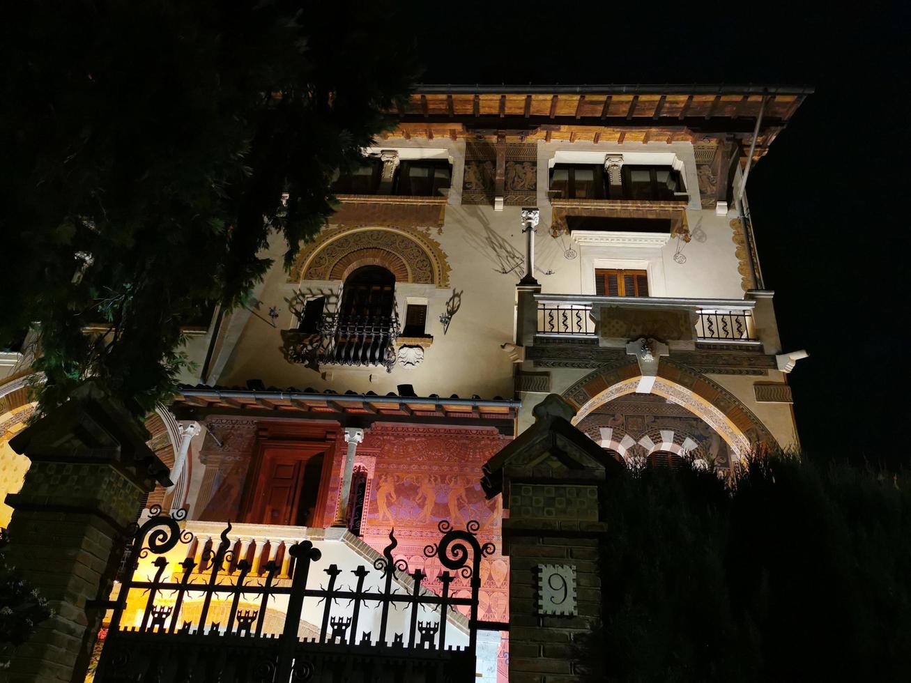 ROME, ITALY - JUNE 14 2019 - Coppede unusual style architechture district in roma buildings at night art nouveau liberty photo