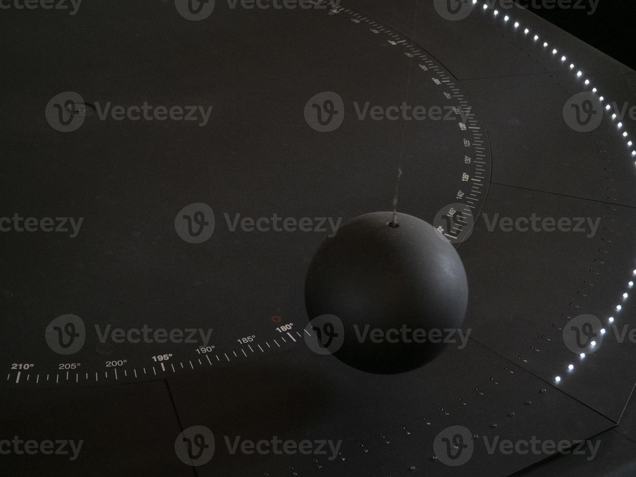 Foucault pendulum ball moving detail photo