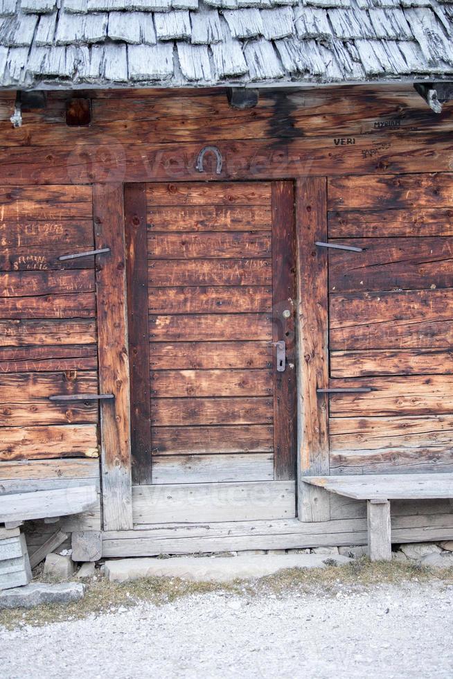 Old wood  mountain cabin hut door photo