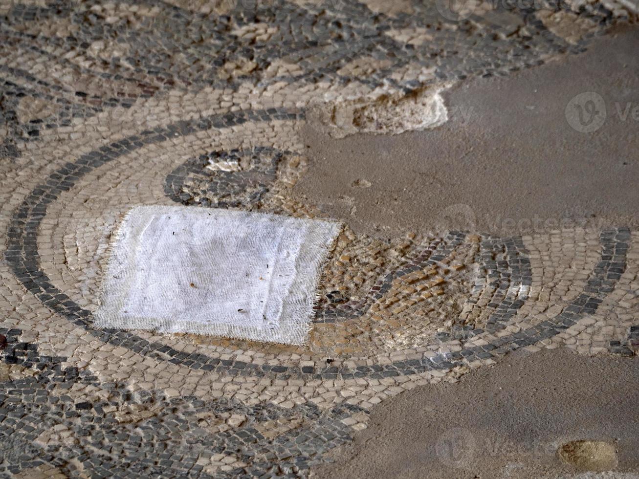 restoring of Ancient Roman mosaic of Villa del Casale, Sicily photo