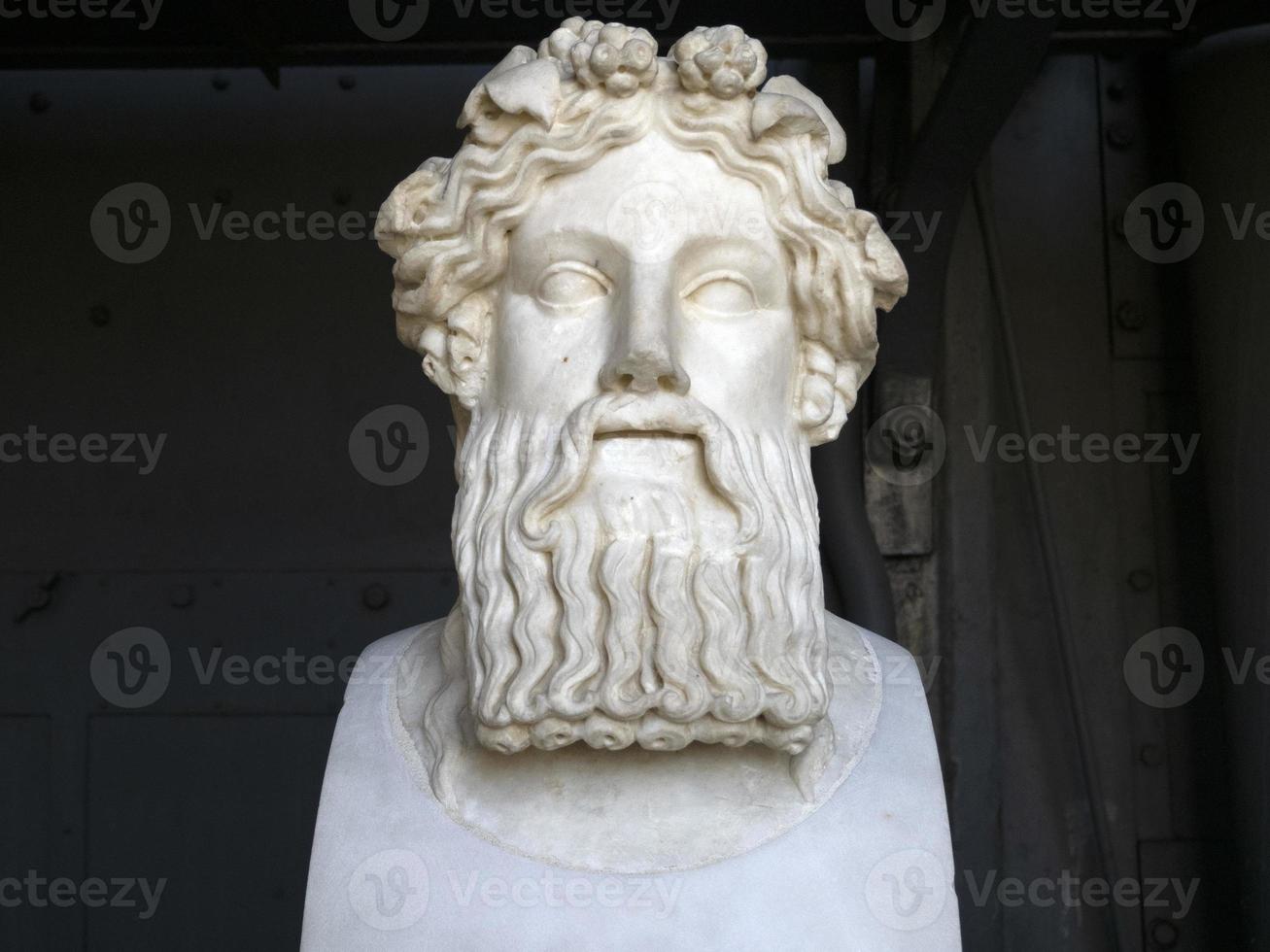 Dionysus old roman marble statue photo