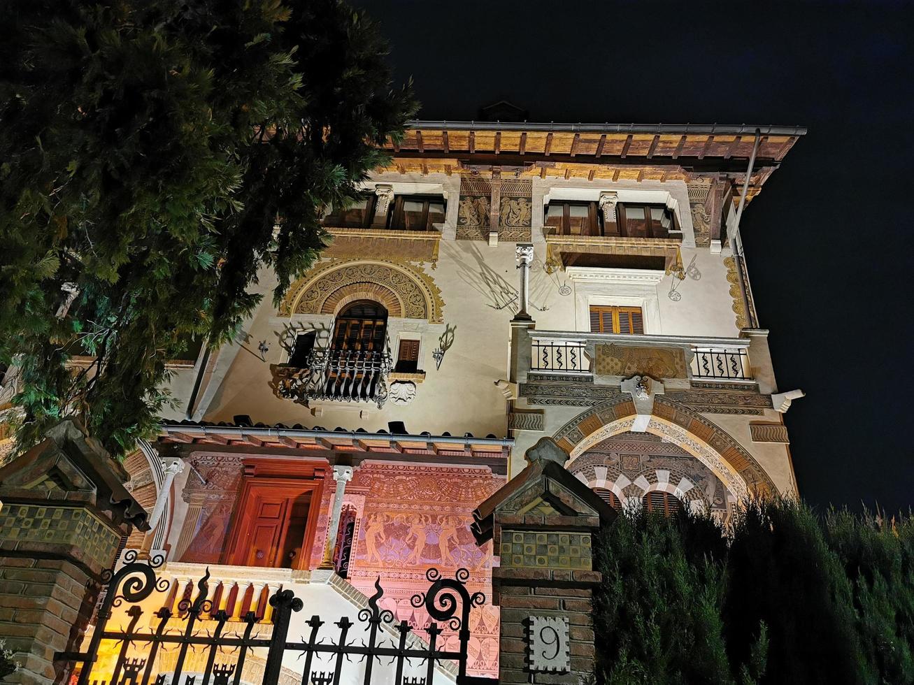 ROME, ITALY - JUNE 14 2019 - Coppede unusual style architechture district in roma buildings at night art nouveau liberty photo
