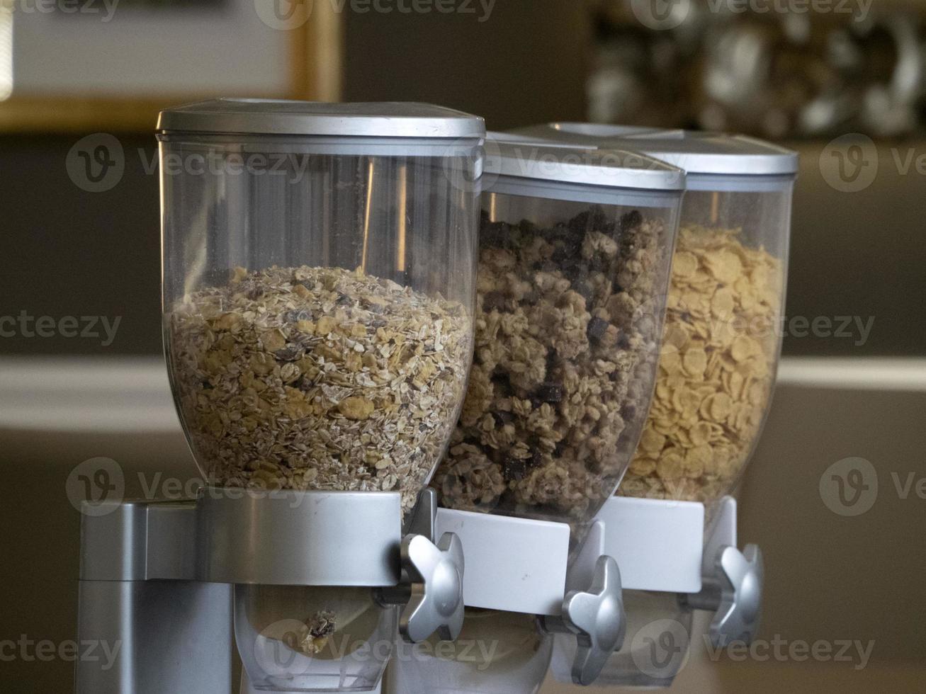 breakfast granola dispenser in hotel 11969293 Stock Photo at Vecteezy