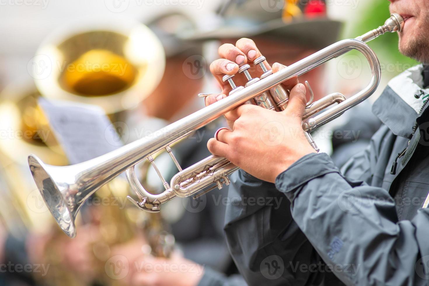 Trumpet player in military fanfare during a ceremony photo