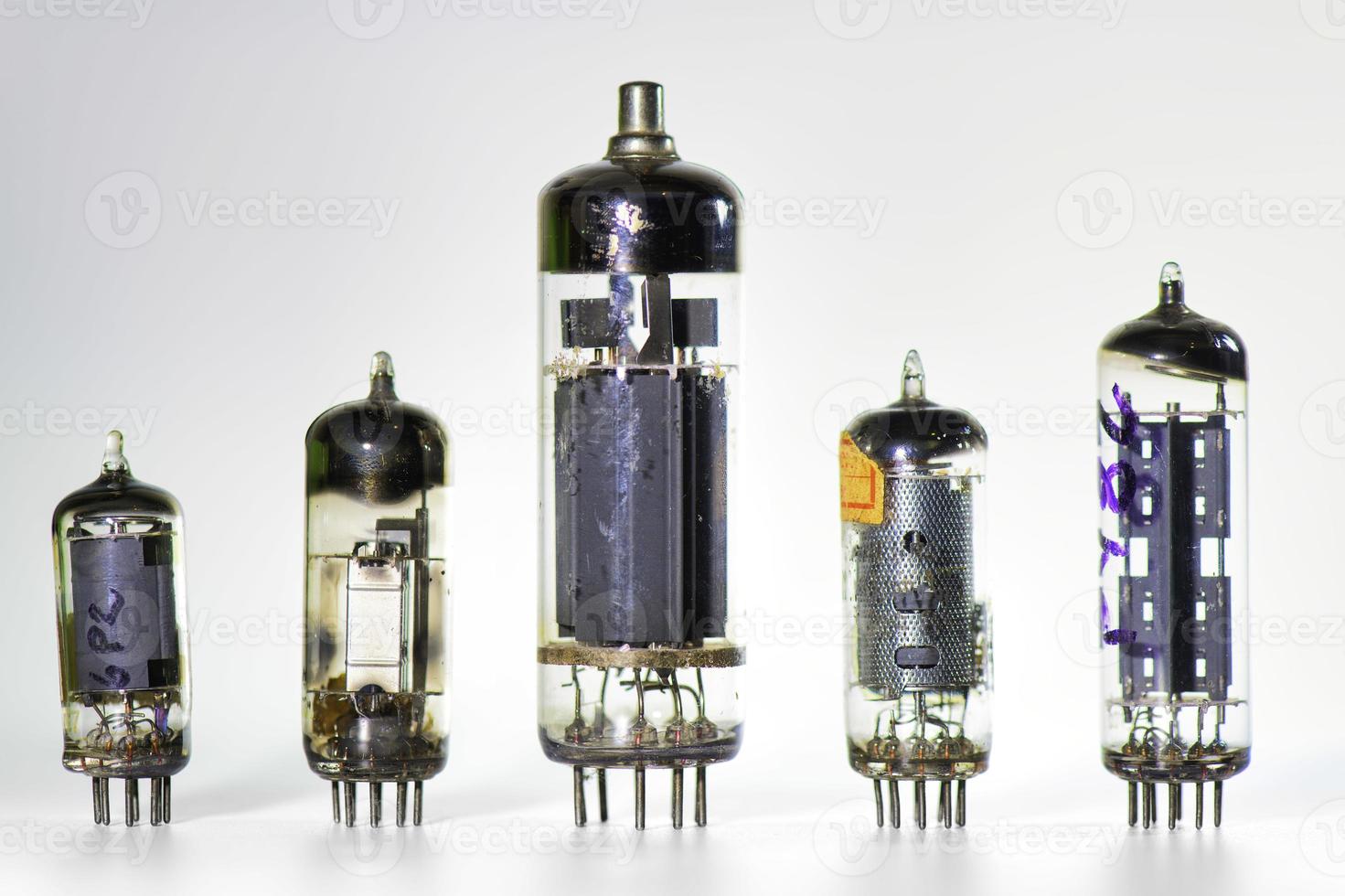 Some old used valves on a white background photo