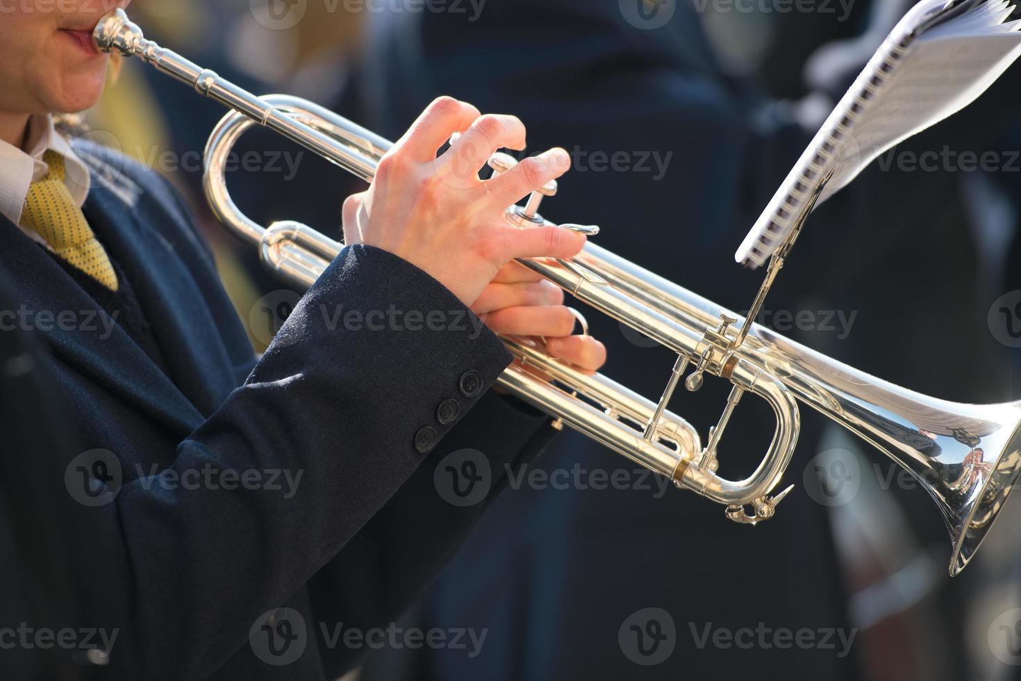 Trumpet plays in the band photo