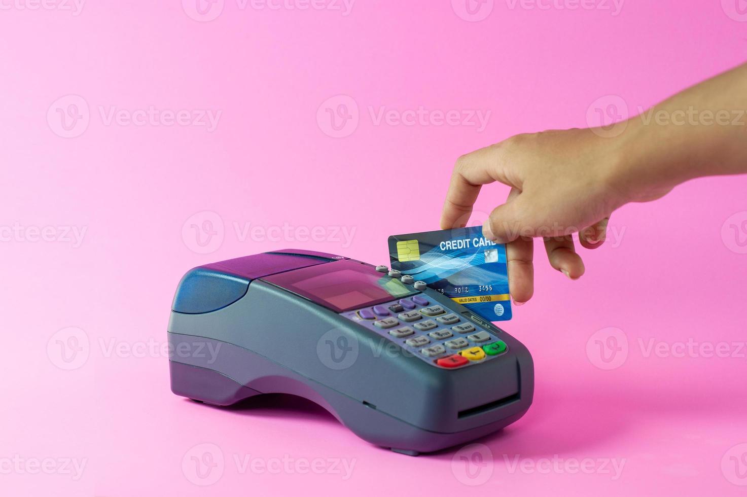 Moment of payment with a credit card through terminal  Business solutions, success and strategy concept. photo