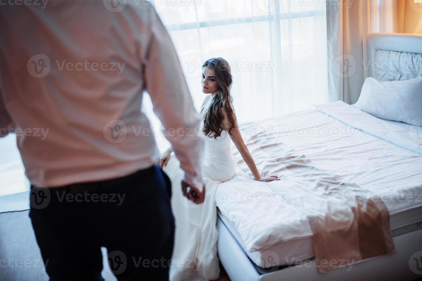 bride in hotel room photo