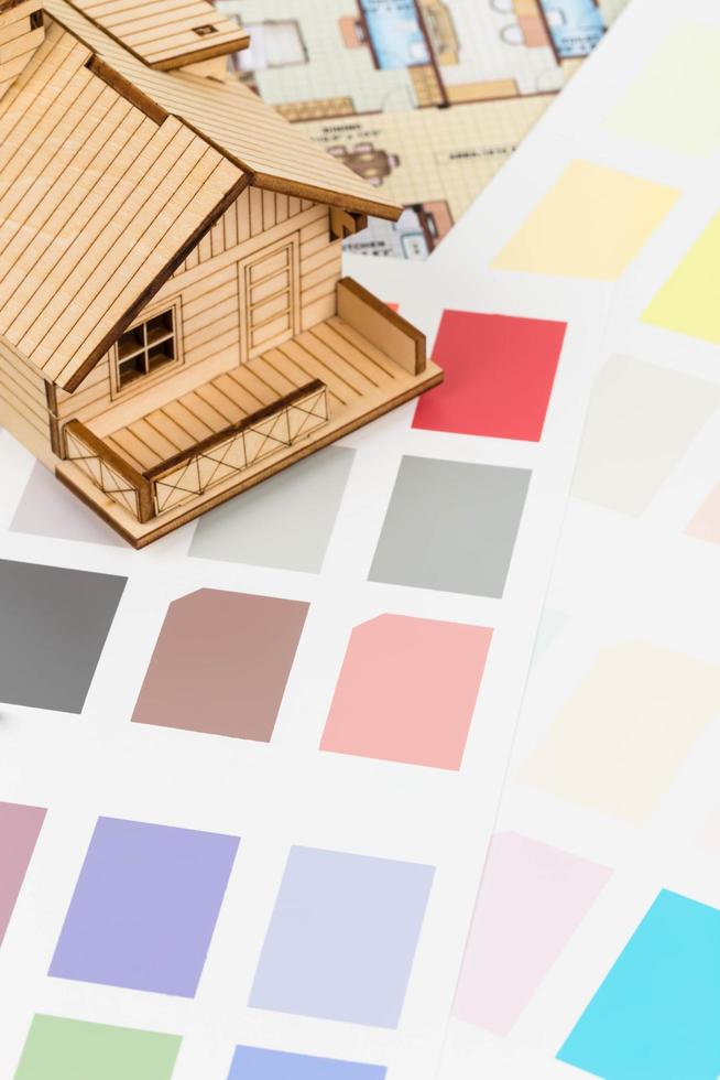 Paint color sample catalog with drawing, and house model photo