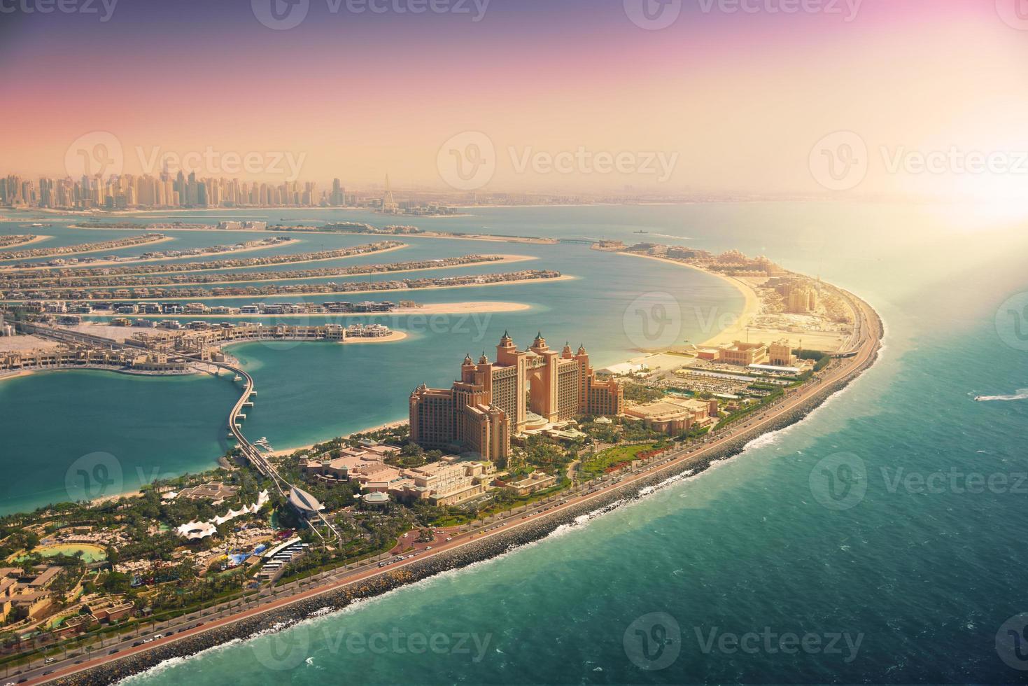 Dubai skyline from Palm Island at sunset photo