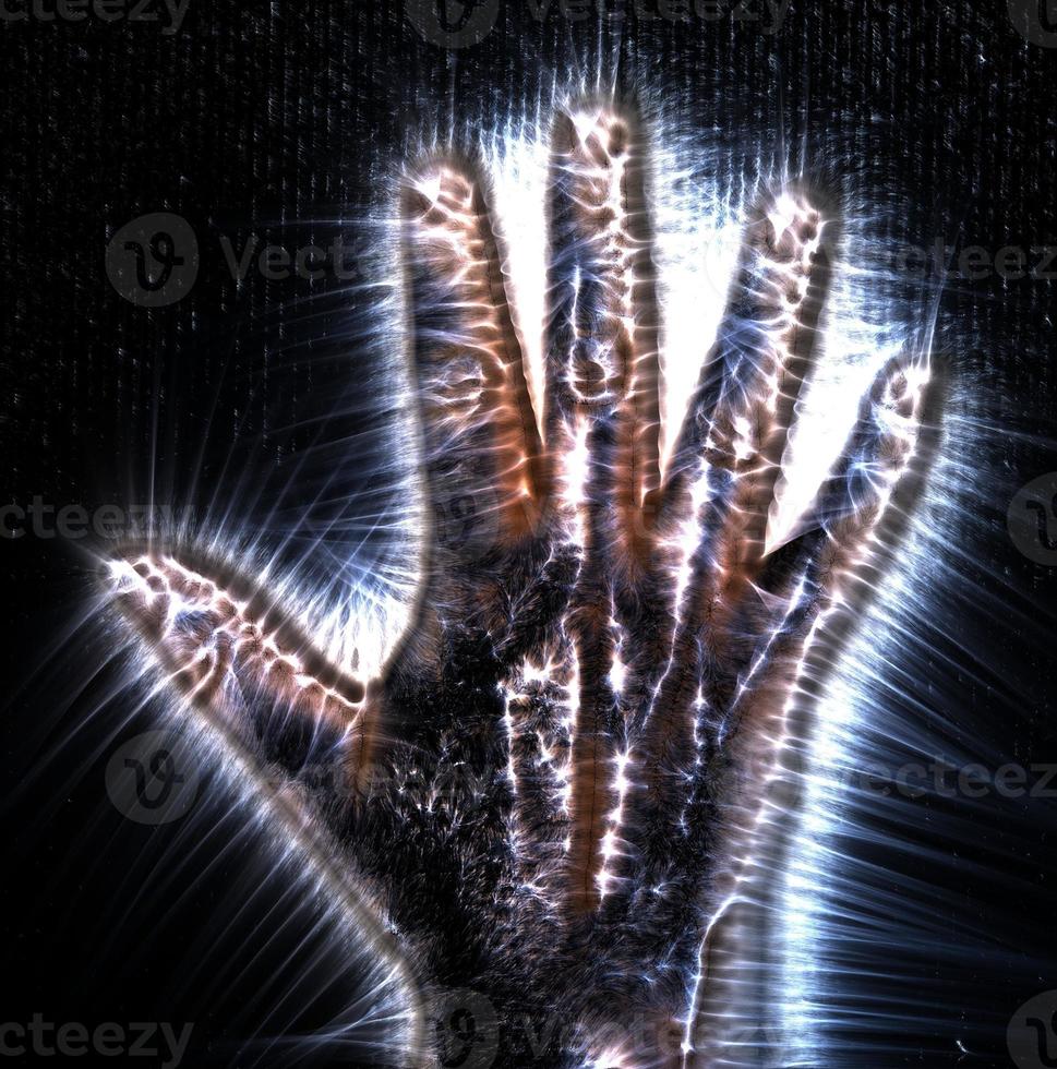 3D-Illustration of a glowing human female hand with a kirlian aura showing different symbols photo