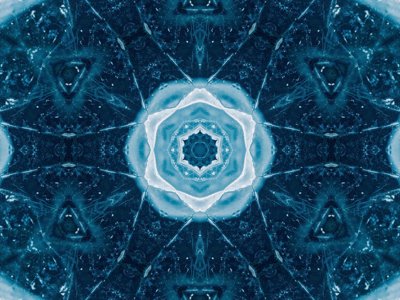 Reflection of deep blue sea in kaleidoscope pattern. Dark blue abstract background. Free photo. photo