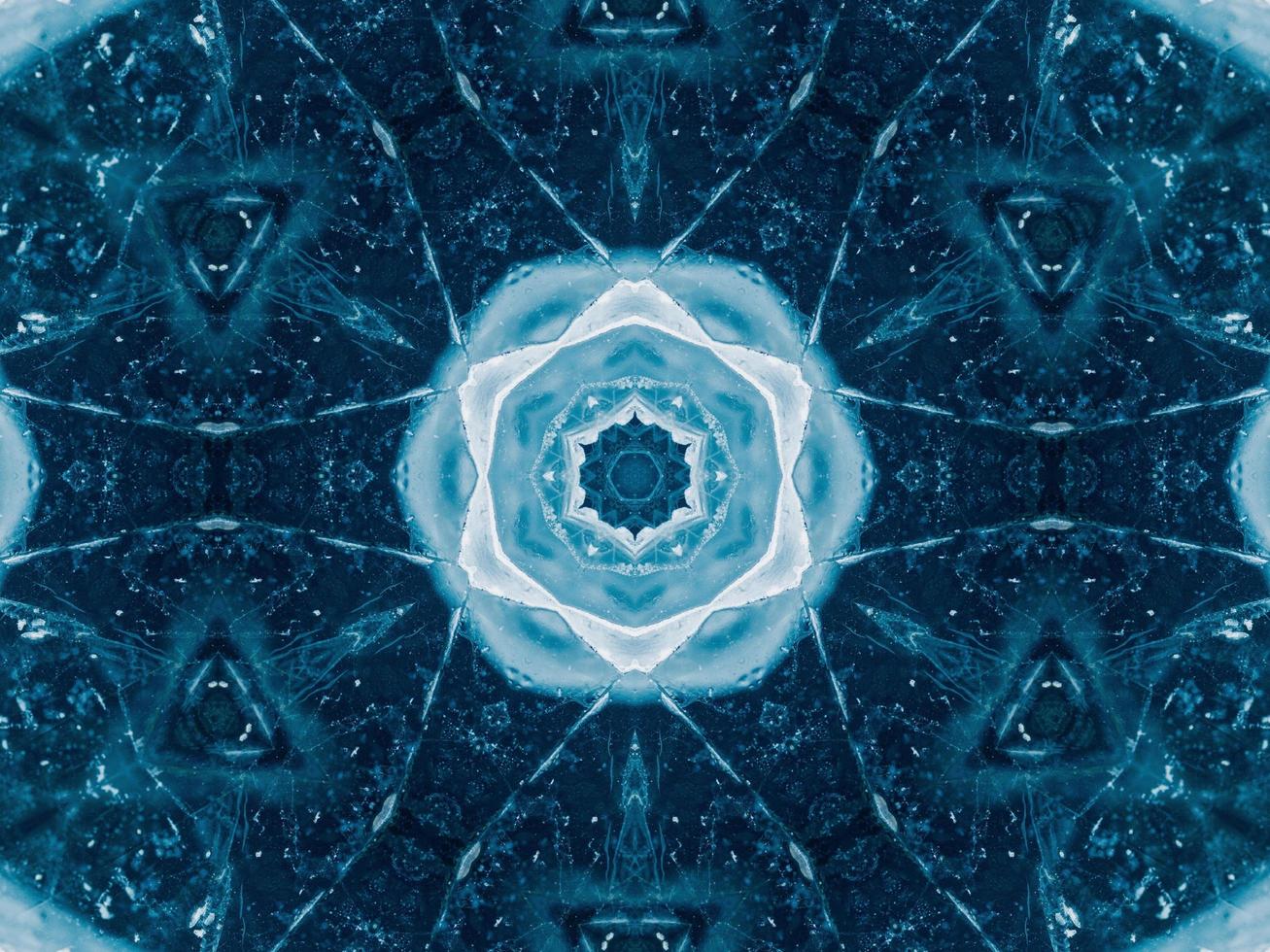 Reflection of deep blue sea in kaleidoscope pattern. Dark blue abstract background. Free photo. photo