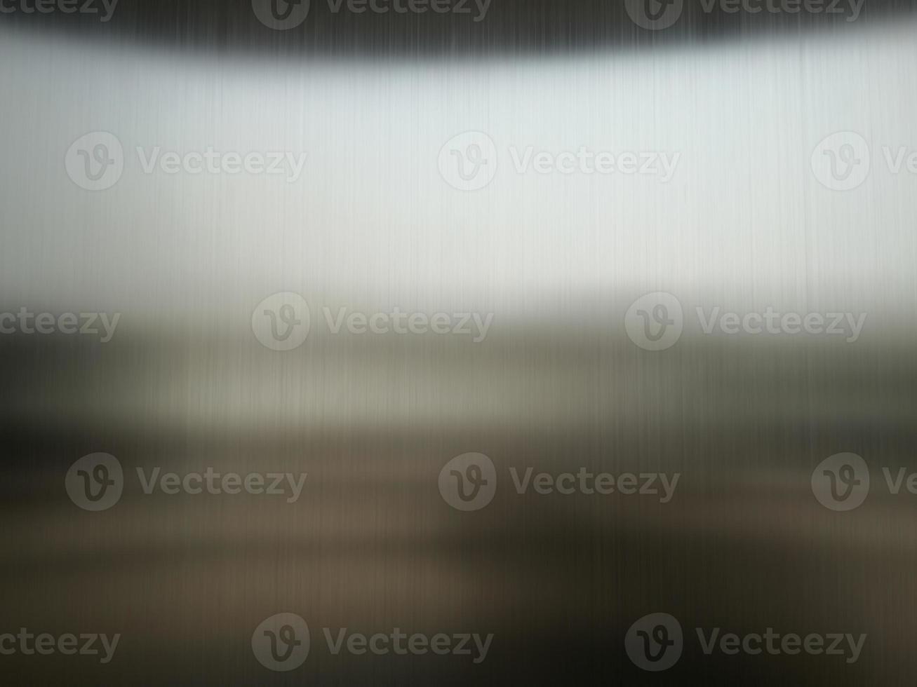 Stainless steel large sheet  With light hitting the surface  For background,Inside passenger elevator,Reflection of light on a shiny metal texture,stainless steel background. photo