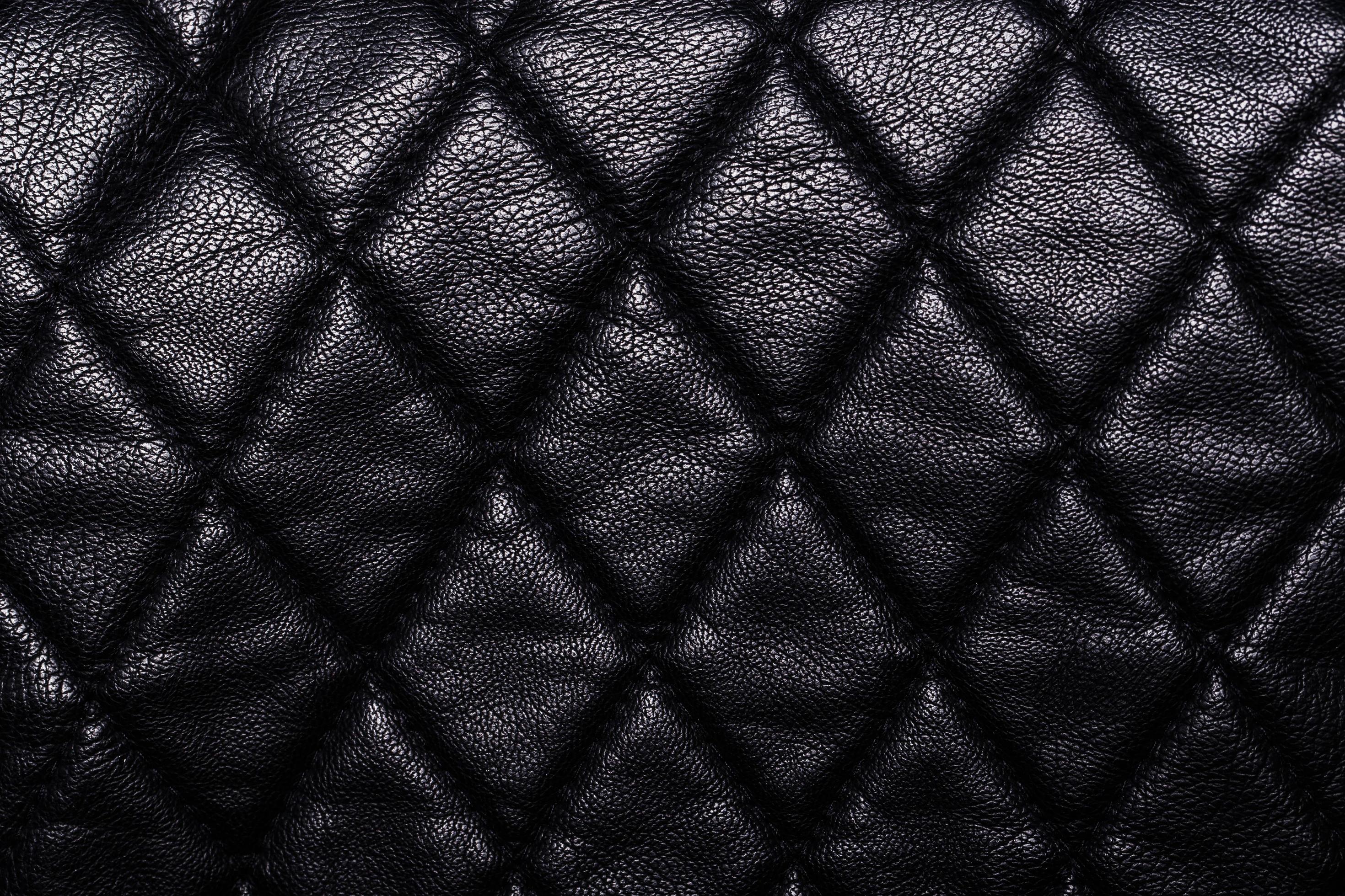 black leather background 11974522 Stock Photo at Vecteezy