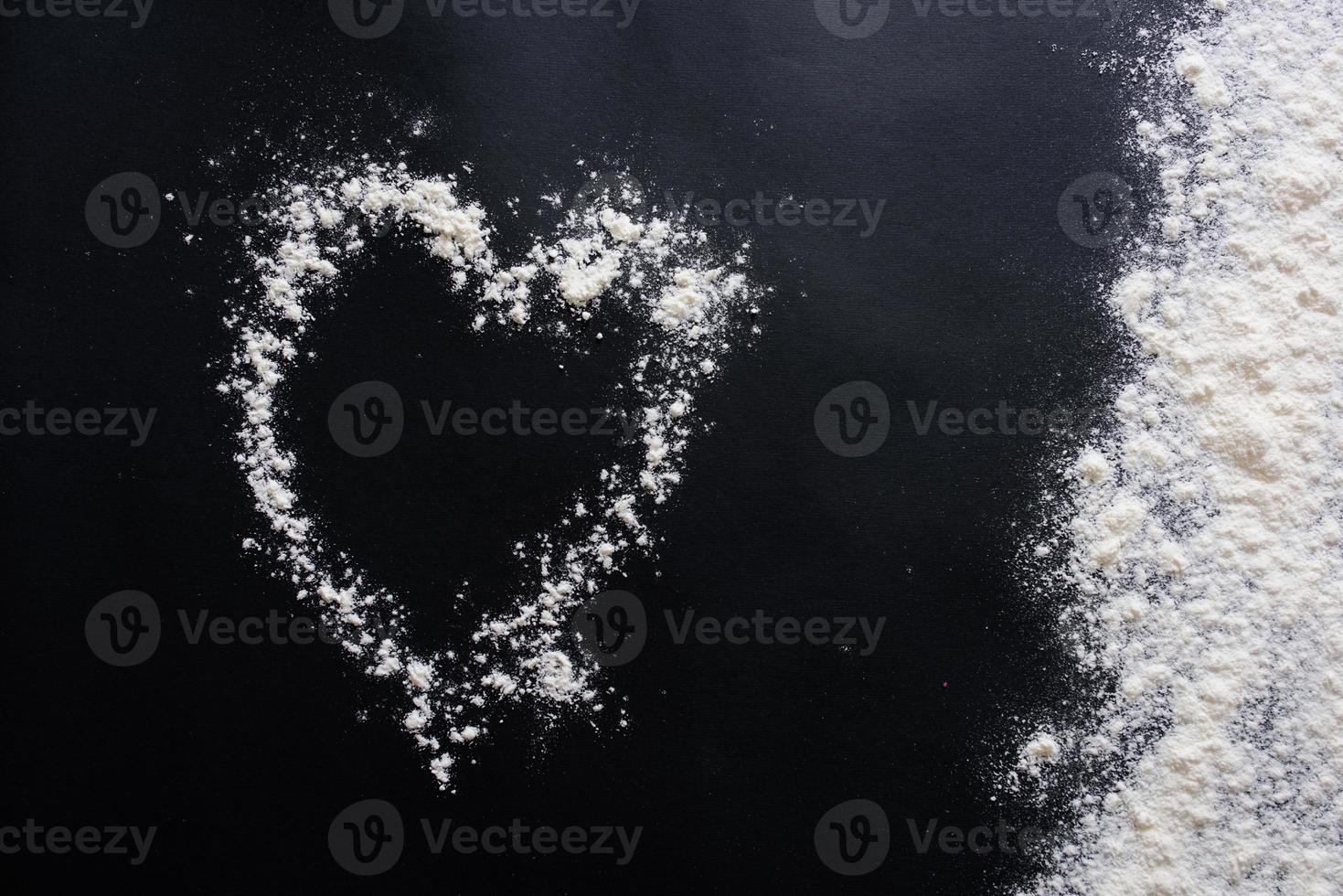 Baking background with copy space on black surface for your text. Top view. photo